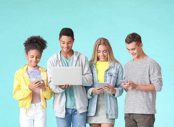 Teenagers with different devices on color background -how to buy tiktok followers - Mastering Social Media Algorithms: Strategies for Success in 2025